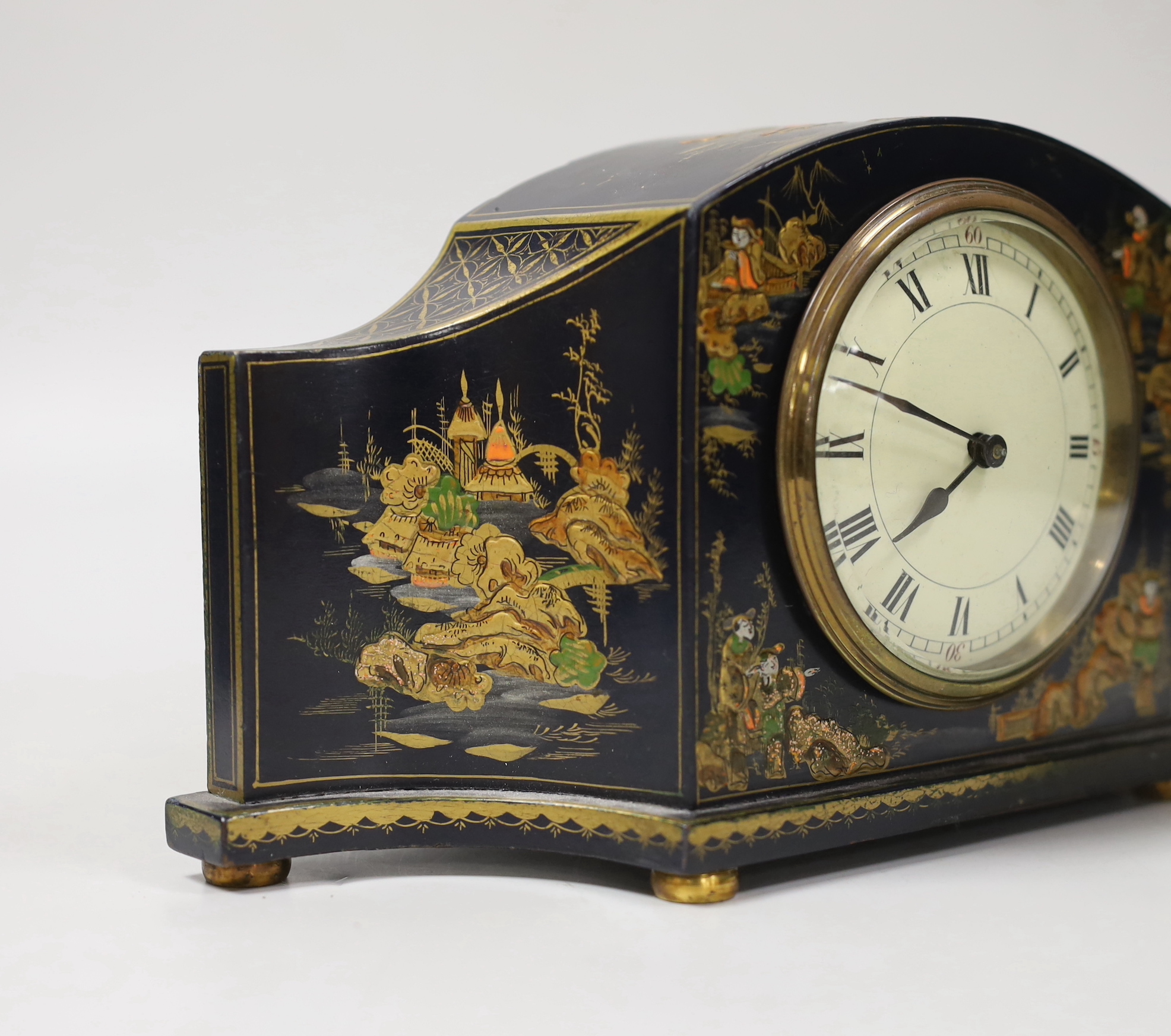 A French japanned mantel timepiece, 26cm wide